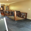 Custom Built Railing with Glass and Stair Wall Shelving - With Walnut Finish